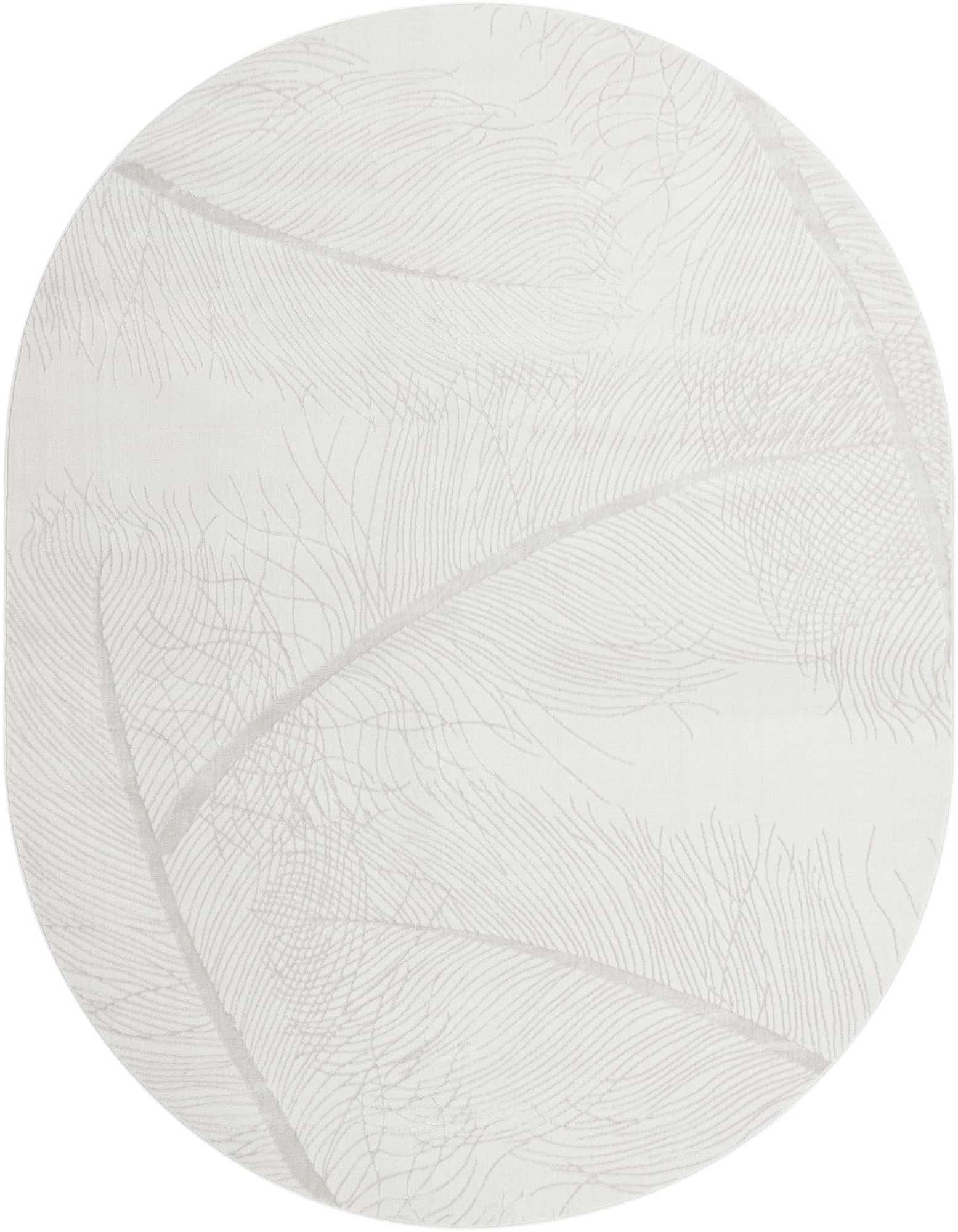 An oval ivory and white Finsbury rug featuring a subtle tropical feather pattern with high/low textured pile.