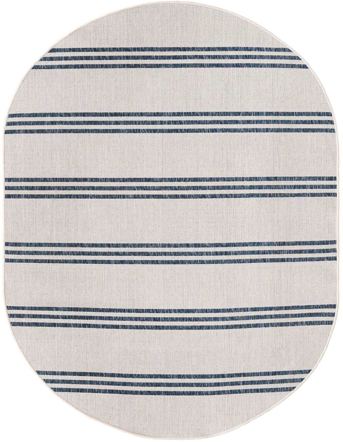 An oval 5' 3 x 8' 0 ivory and cream rug with horizontal navy blue stripes, suitable for a patio or indoor space.