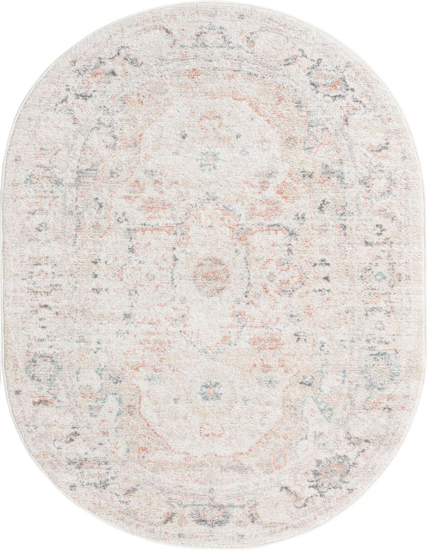 An oval 4'x6' Madeline Vintage rug in ivory and cream with a distressed traditional medallion pattern.