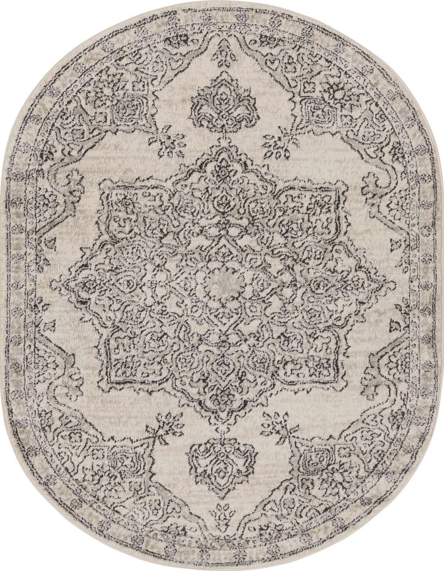 An oval 4' x 6' ivory and cream rug with a distressed traditional medallion pattern and a textured pile.