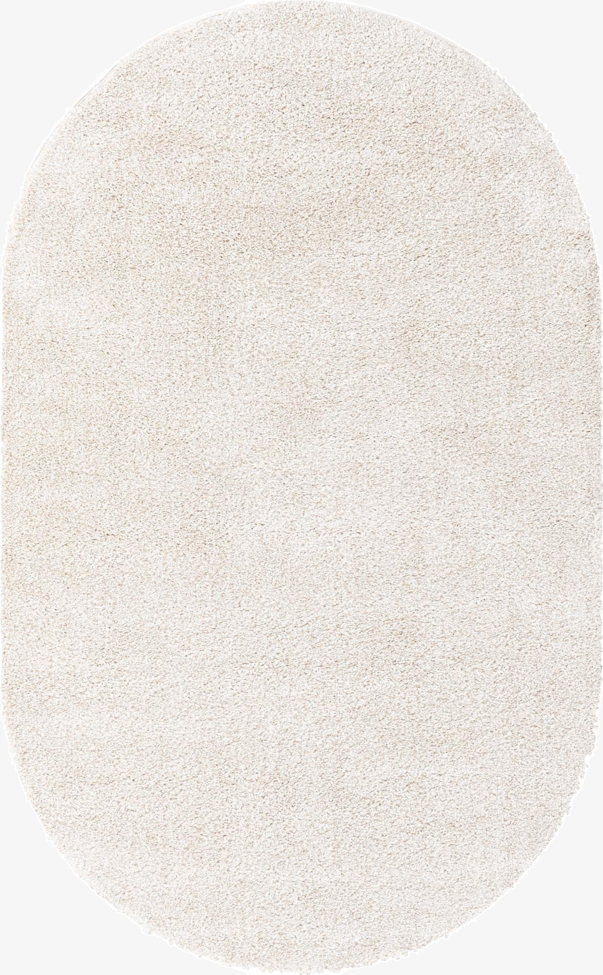 A 5' x 8' oval ivory Solid Frieze rug from Rugs.com, featuring a soft, textured pile.