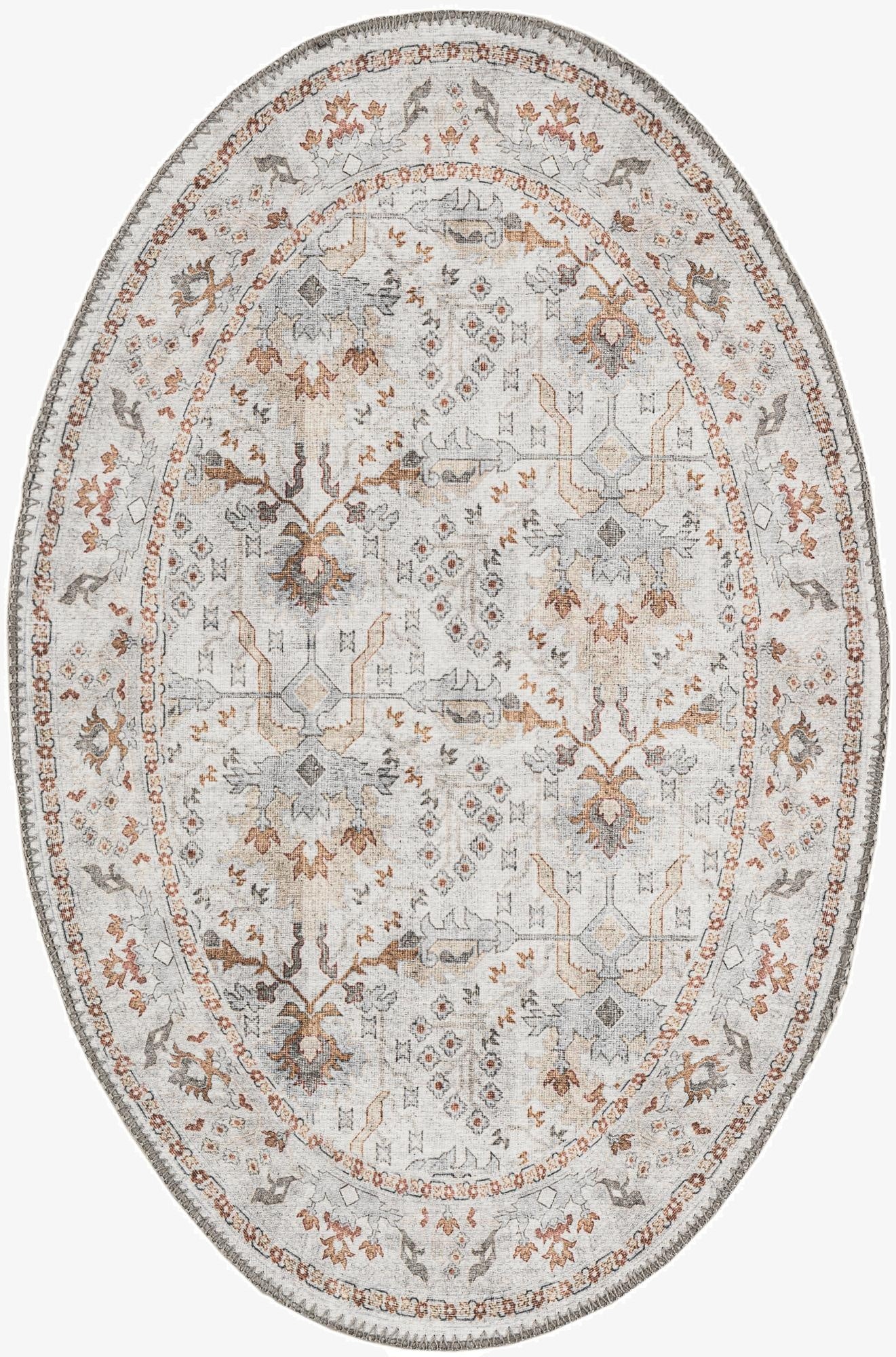 An oval ivory and cream vintage rug with a traditional medallion pattern in muted orange, brown, and grey tones.