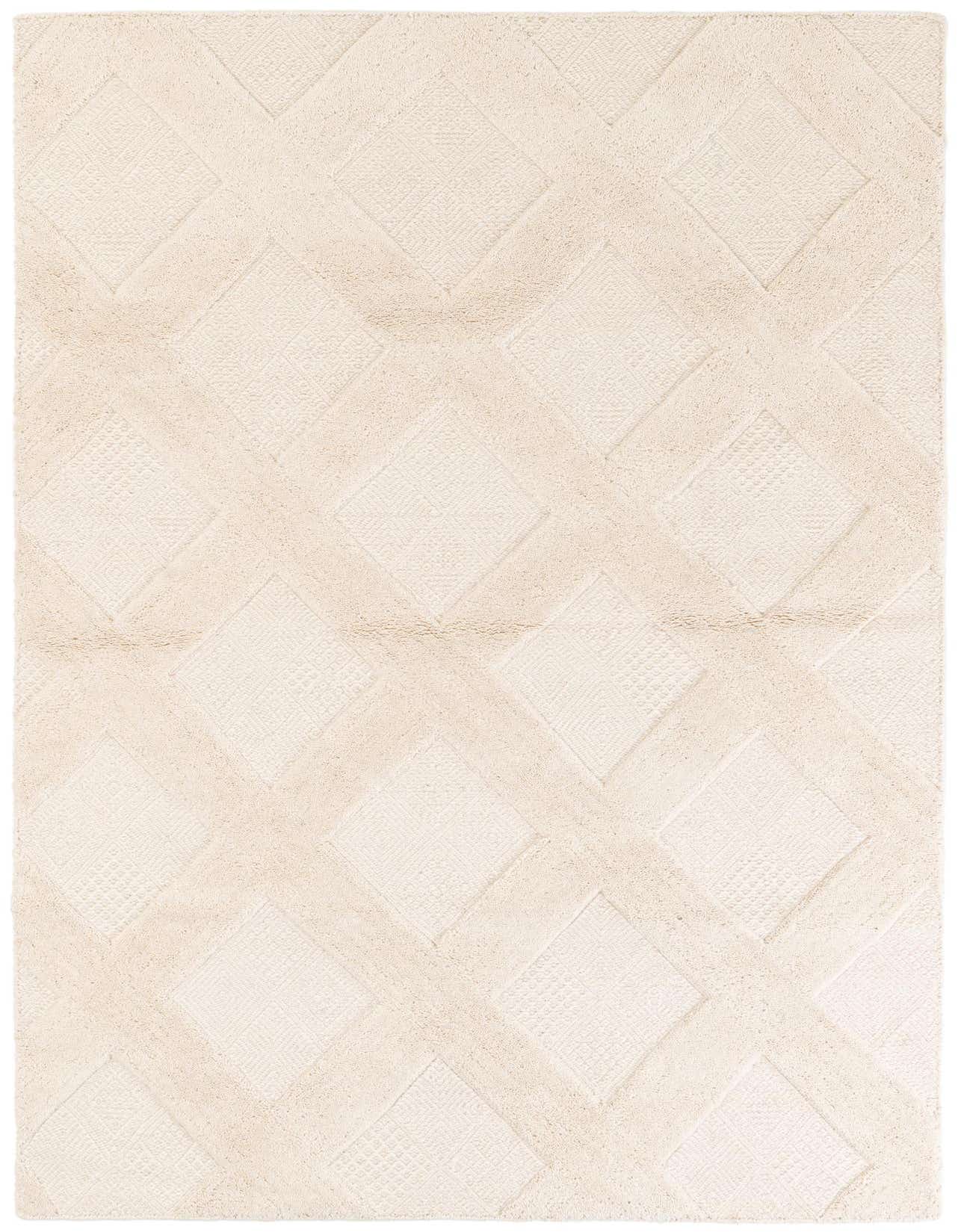 A 5x8 rectangular ivory cotton rug with a modern geometric pattern of textured diamonds, suitable for a living room.