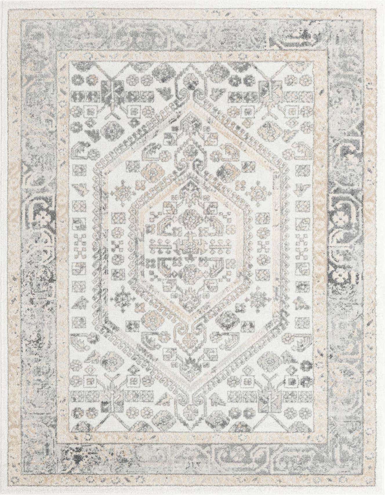 A 6x9 rectangular ivory and cream area rug with a vintage medallion and tribal pattern, featuring gray and beige accents.