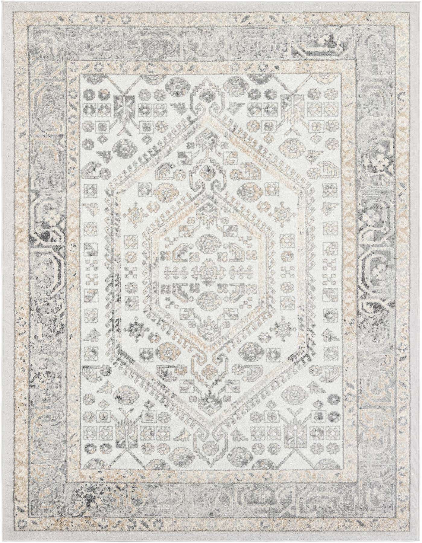 A 7x10 rectangular ivory and gray traditional rug with a central medallion and tribal patterns, ideal for a living room.