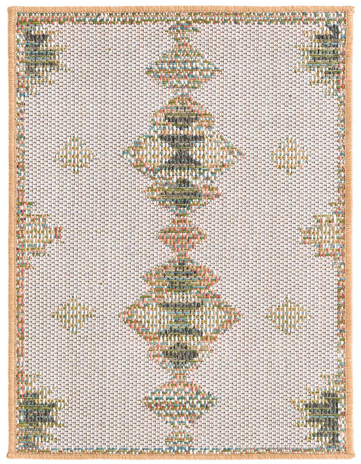 A 2x3 rectangular Baja Outdoor rug featuring a cream background with a central Southwestern diamond pattern in teal, green, and coral, bordered by a tan edge.