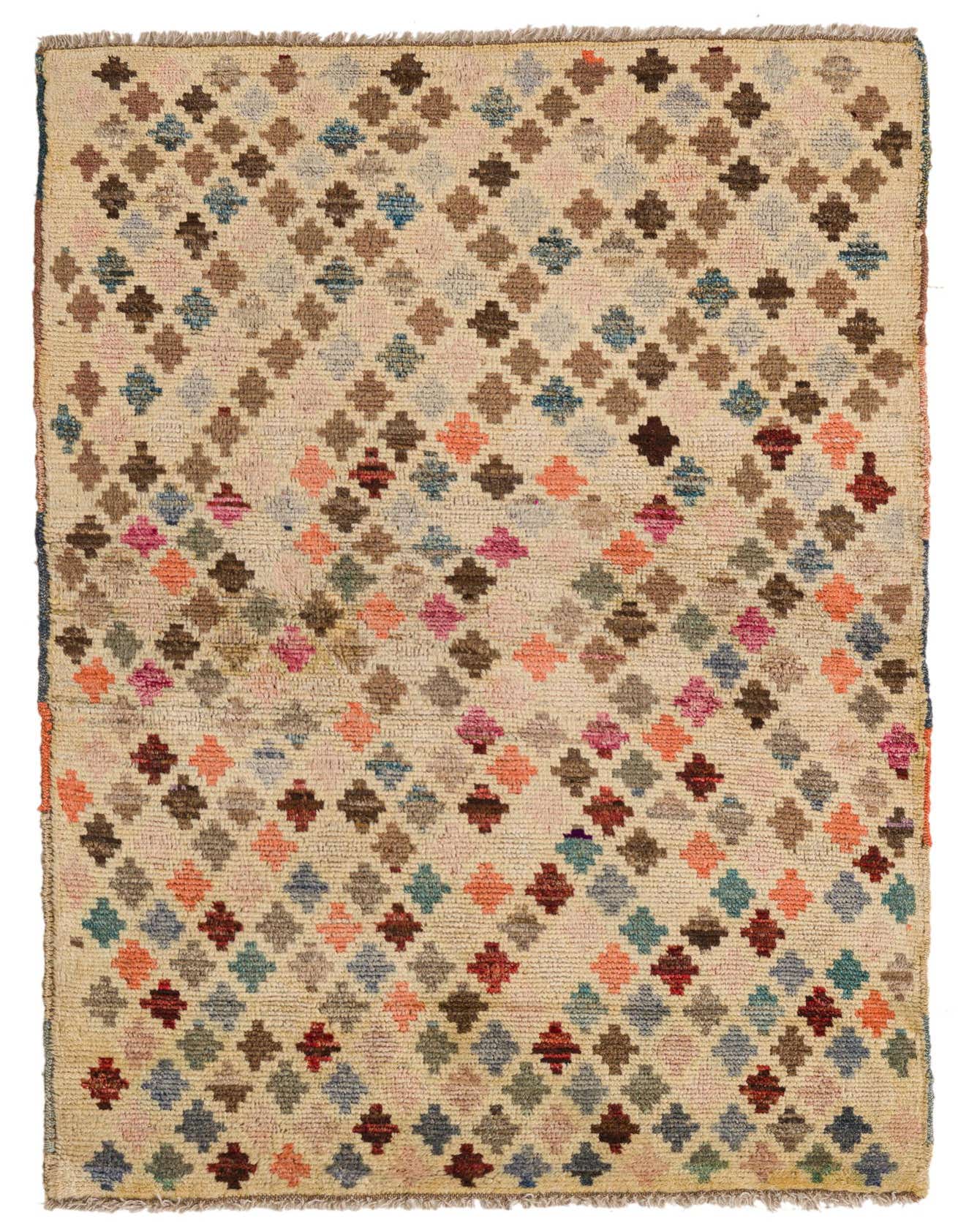 A 3x5 rectangular ivory wool rug with a tribal pattern of multicolored diamond shapes in various pastel and earthy tones.