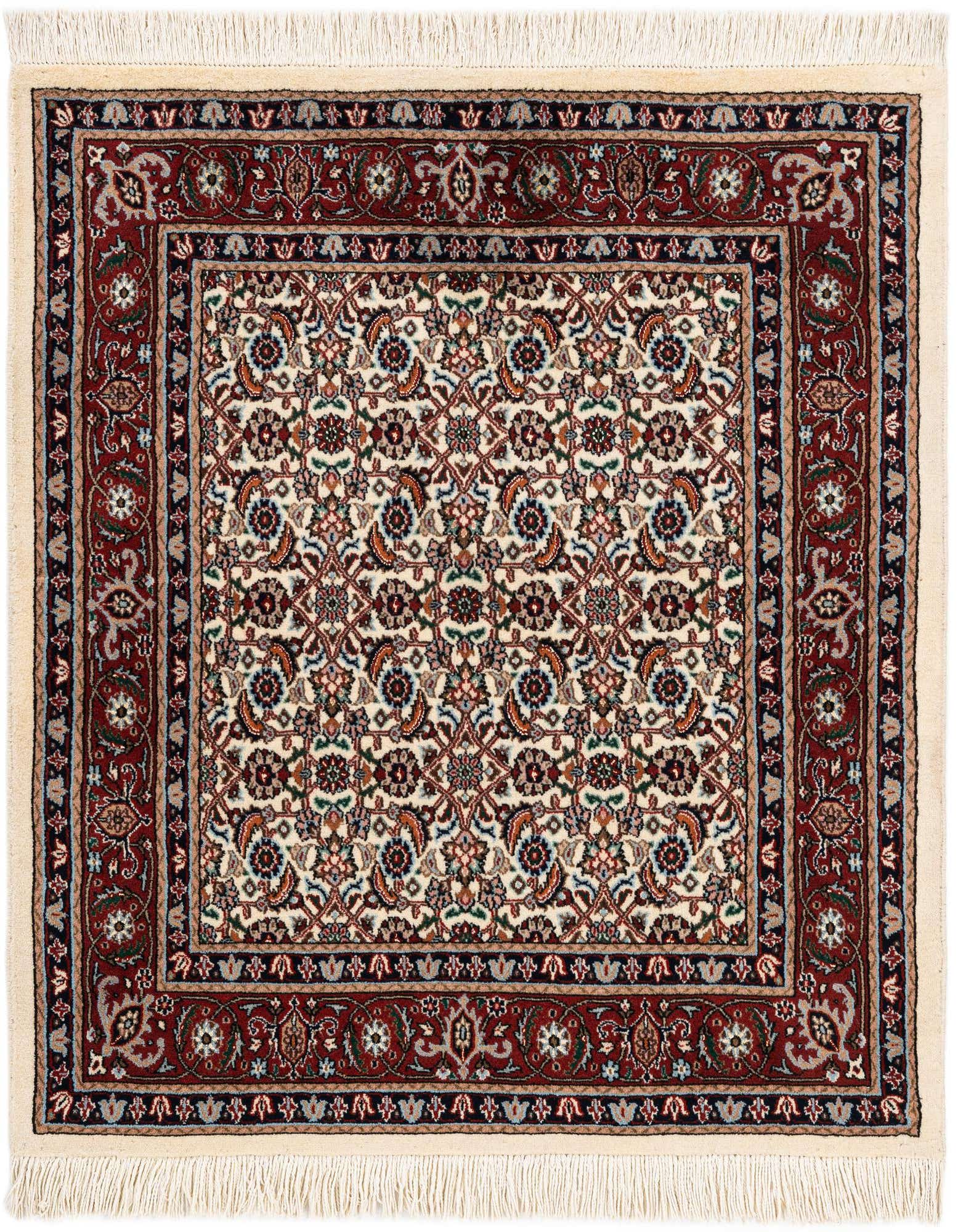 A 3x4 rectangular ivory and red traditional Bidjar wool rug with intricate floral patterns and fringe.