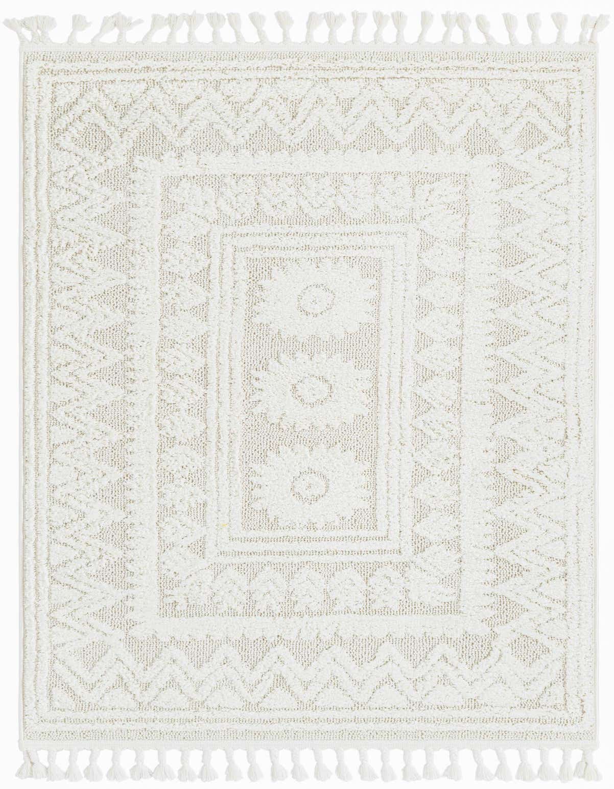 A 4x6 rectangular ivory and cream Southwestern rug with tribal patterns and tassels, ideal for a living room.