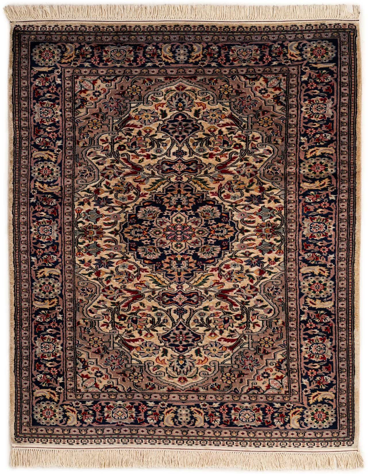 A 4x6 rectangular ivory and cream Bokhara rug with a traditional tribal medallion pattern and fringe.