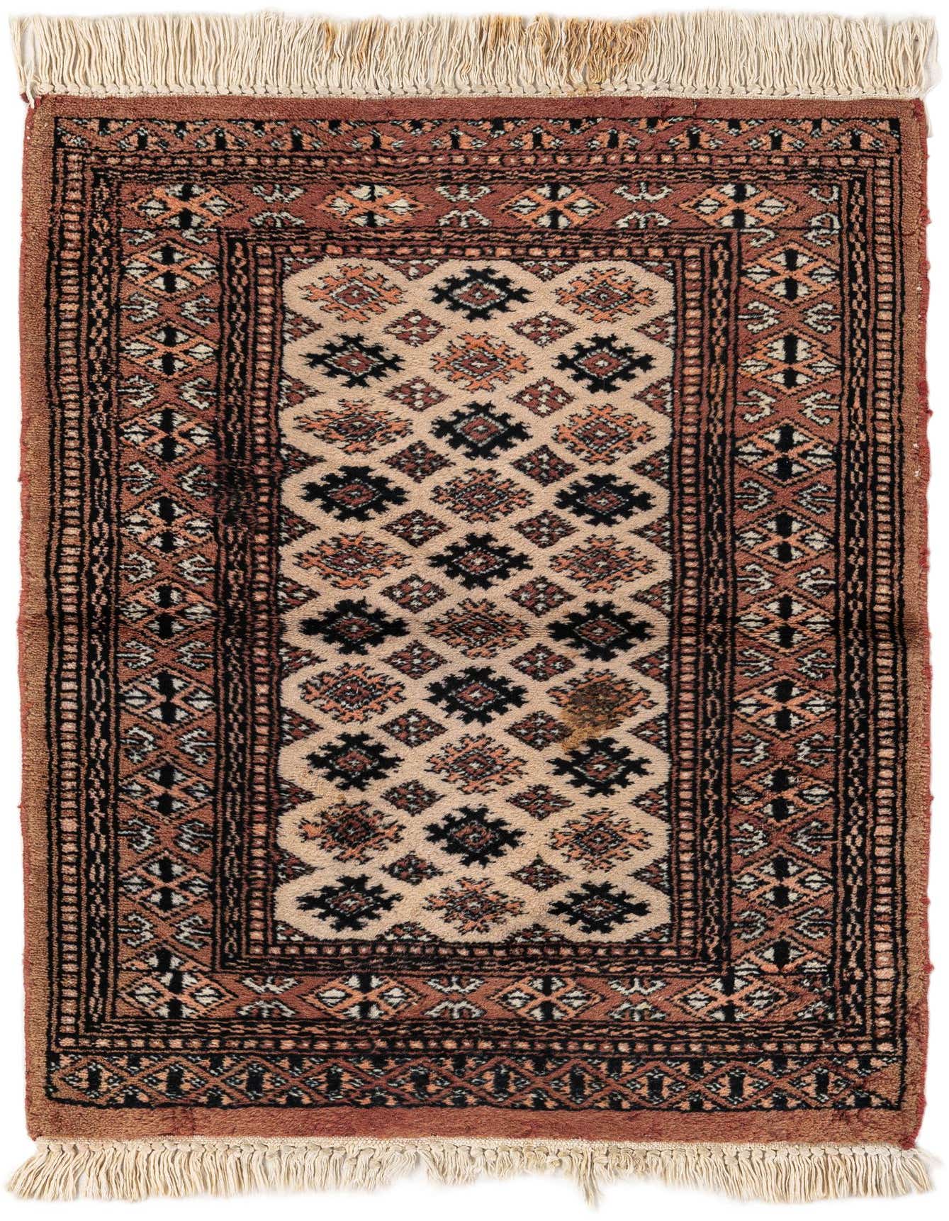 A 2x3 rectangular Bokhara rug with a cream field and traditional tribal patterns in black and rust, featuring white fringe.