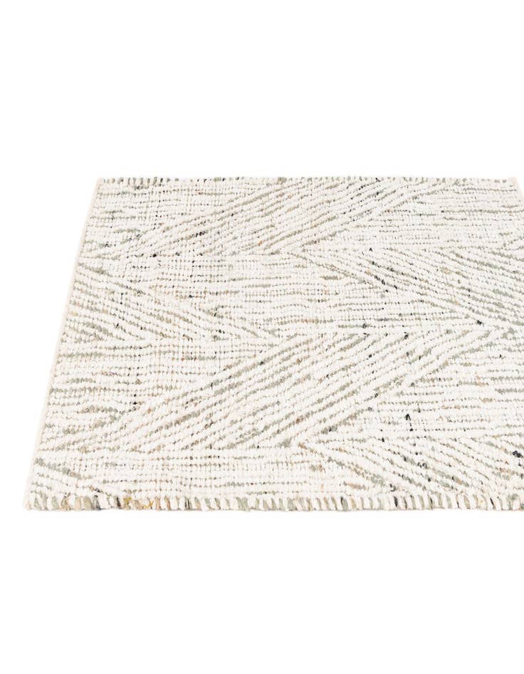 Detail image of  2' 2 x 3' 2  Hand Woven Chindi Braided Jute Rug