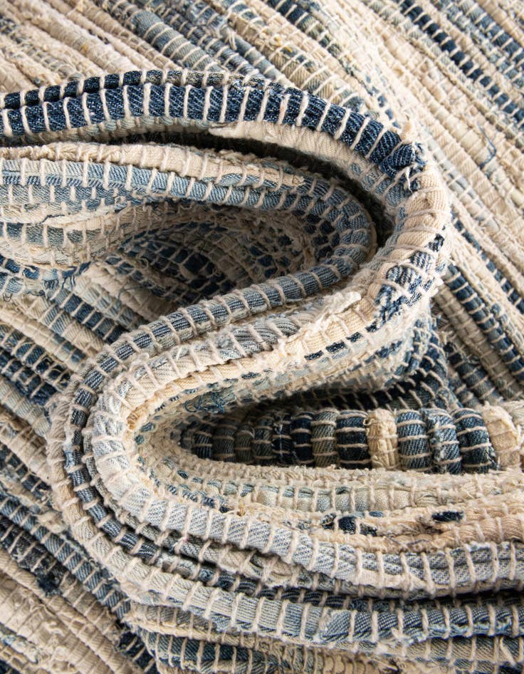 Detail image of  4' 1 x 5'  Hand Braided Chindi Jute Rug