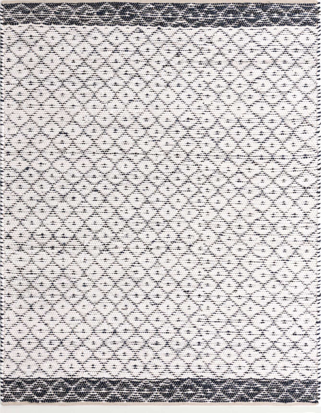 A 6x9 rectangular ivory and black flatweave rug with a subtle geometric trellis pattern and textured pile.