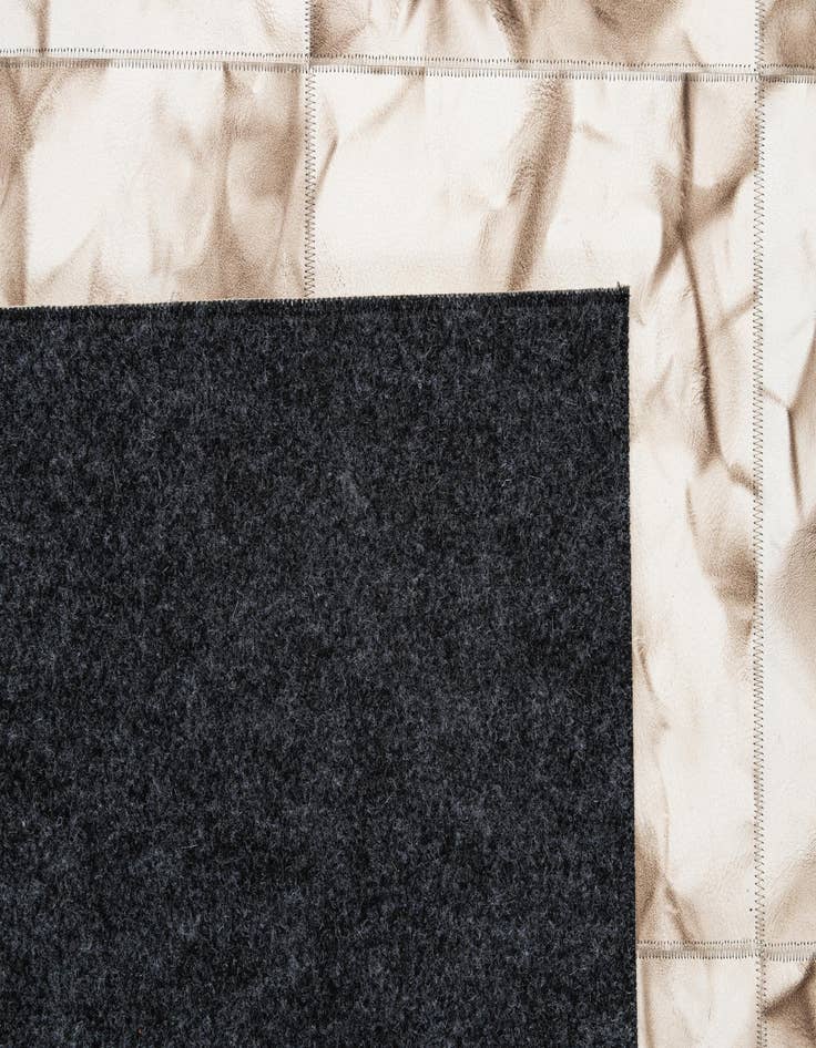 Detail image of  5' x 7' 11 Cowhide - Patchwork Rug