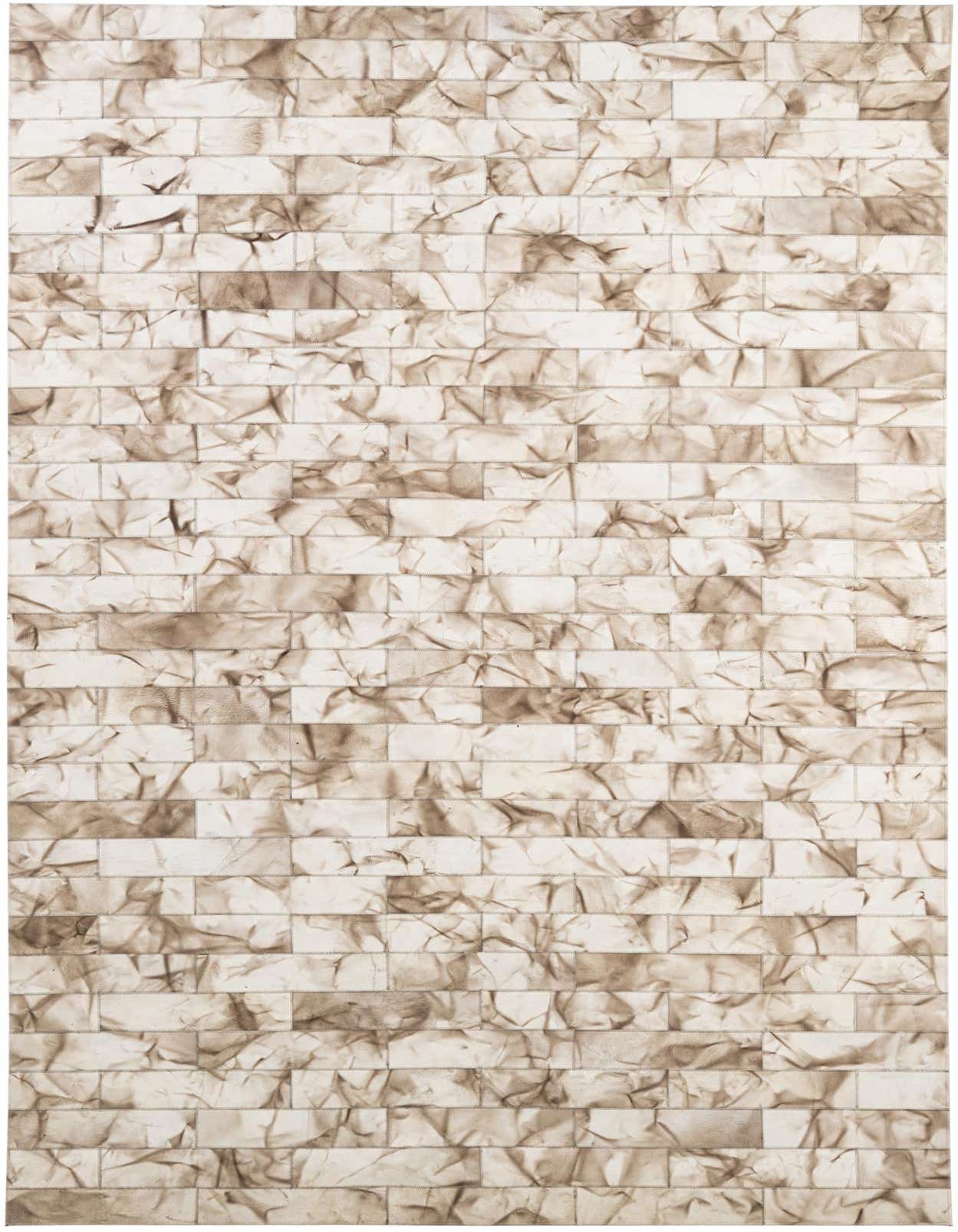 A 5x8 rectangular Cowhide Patchwork rug in ivory and cream, featuring a modern, abstract brick-like pattern.