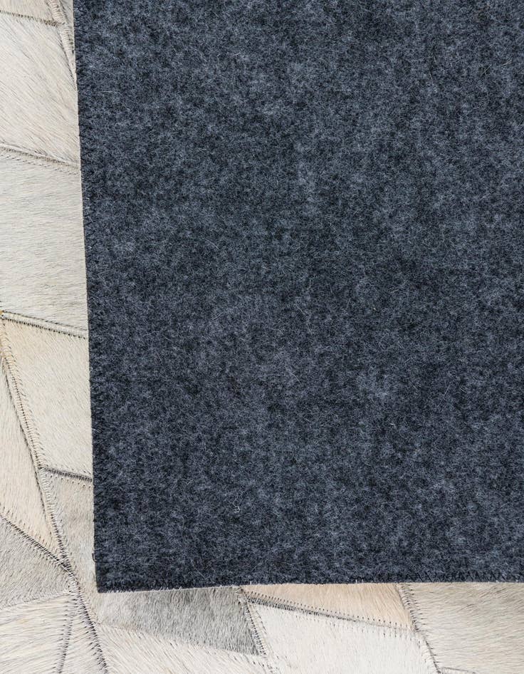 Detail image of  4' 10 x 7' 9 Cowhide Leather Rug