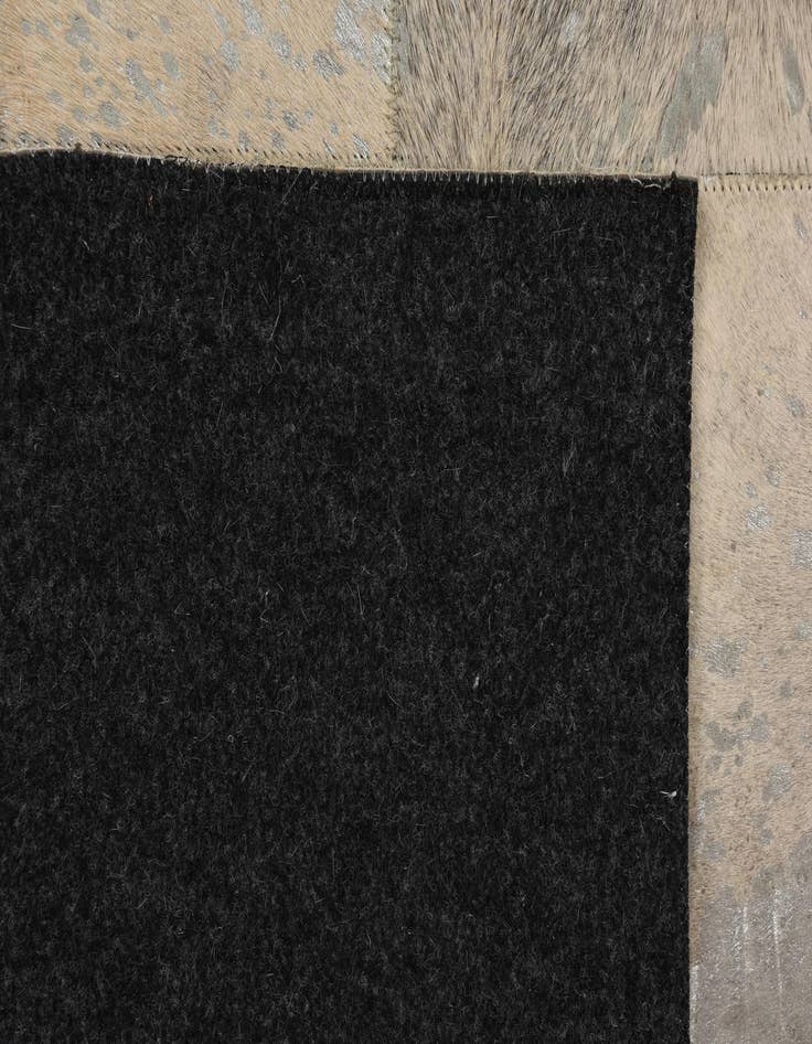 Detail image of  5' 1 x 7' 10 Cowhide Rug