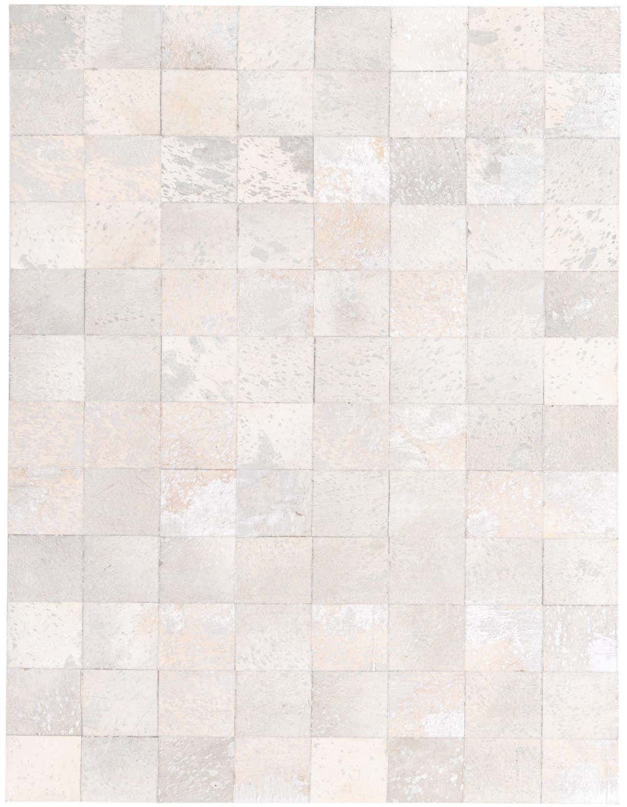 A 5x8 rectangular Cowhide rug featuring a modern patchwork design in varying shades of ivory and cream.