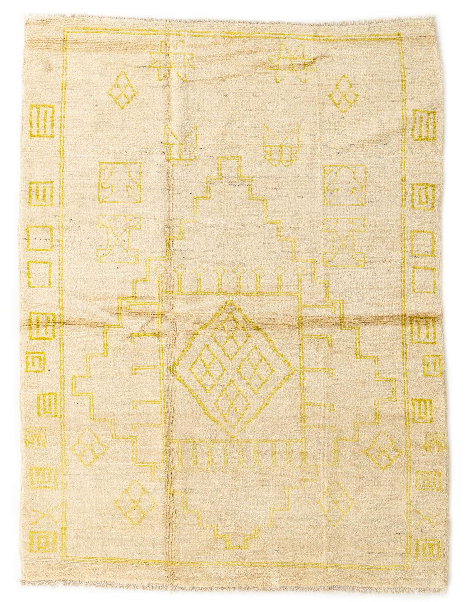 A 5x8 rectangular ivory wool rug with a high pile, featuring a modern abstract yellow geometric pattern.