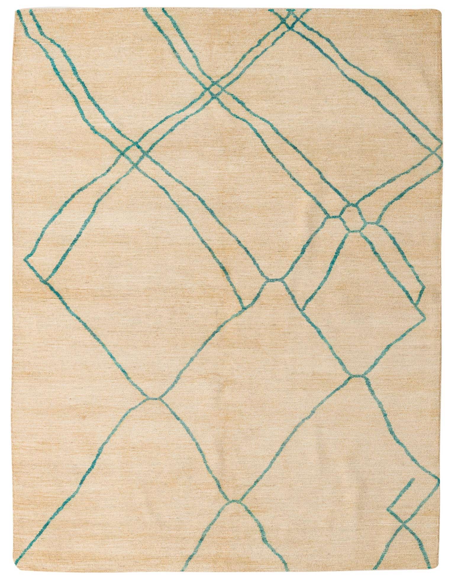 A 5x8 rectangular ivory wool rug with a modern abstract teal geometric pattern, suitable for a living room.