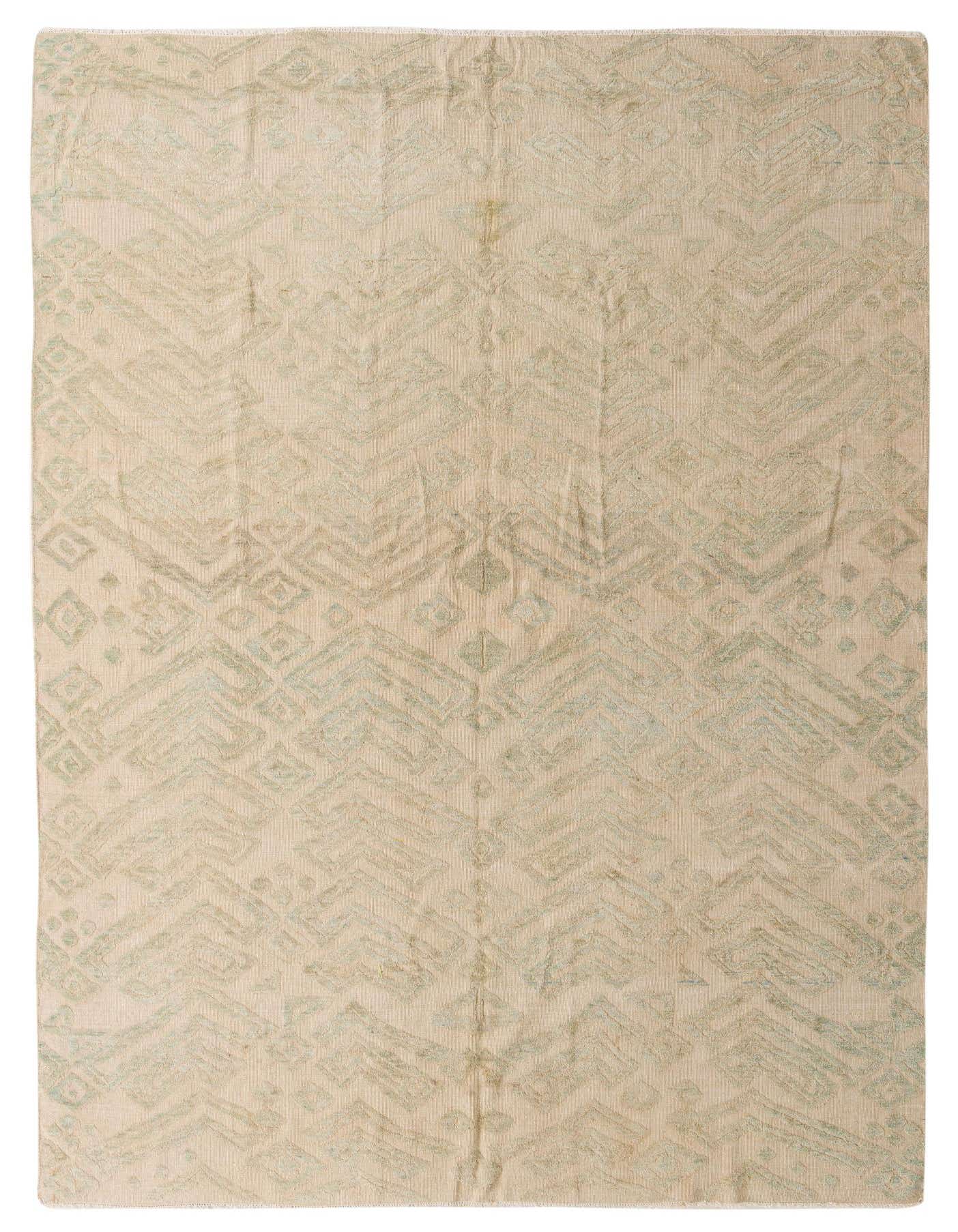 A 10x14 rectangular ivory wool rug with a subtle, textured modern abstract pattern in cream and light blue tones.