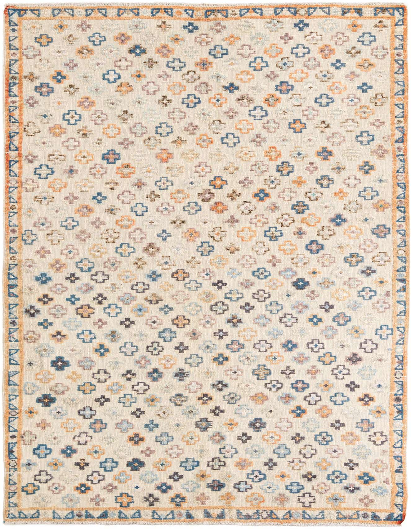 A 6x9 rectangular ivory wool rug with a modern abstract pattern of colorful quatrefoil shapes and a thin geometric border.