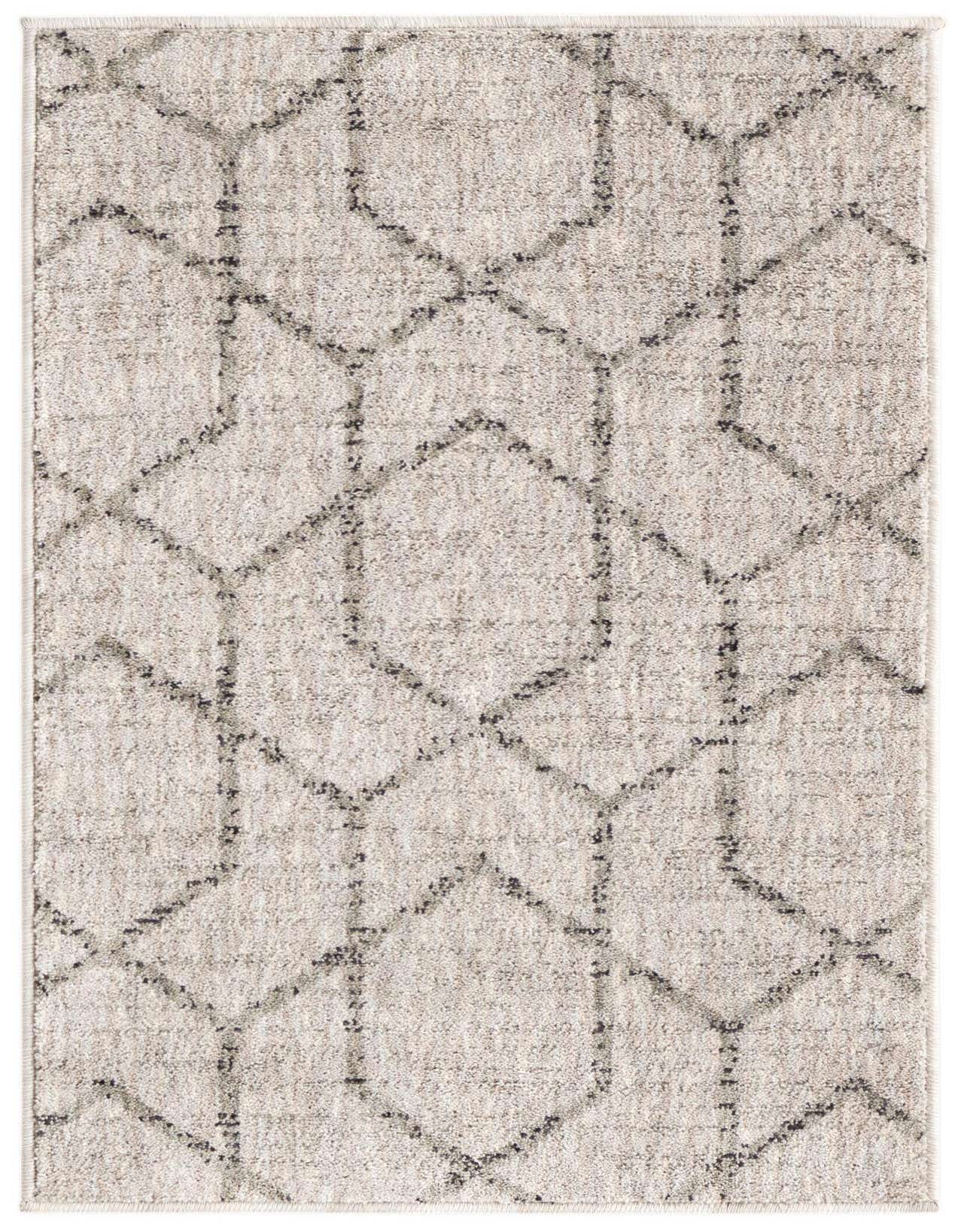 A 2x3 rectangular Eco Trellis rug in ivory and cream with a modern abstract geometric pattern, made from recycled polyester.