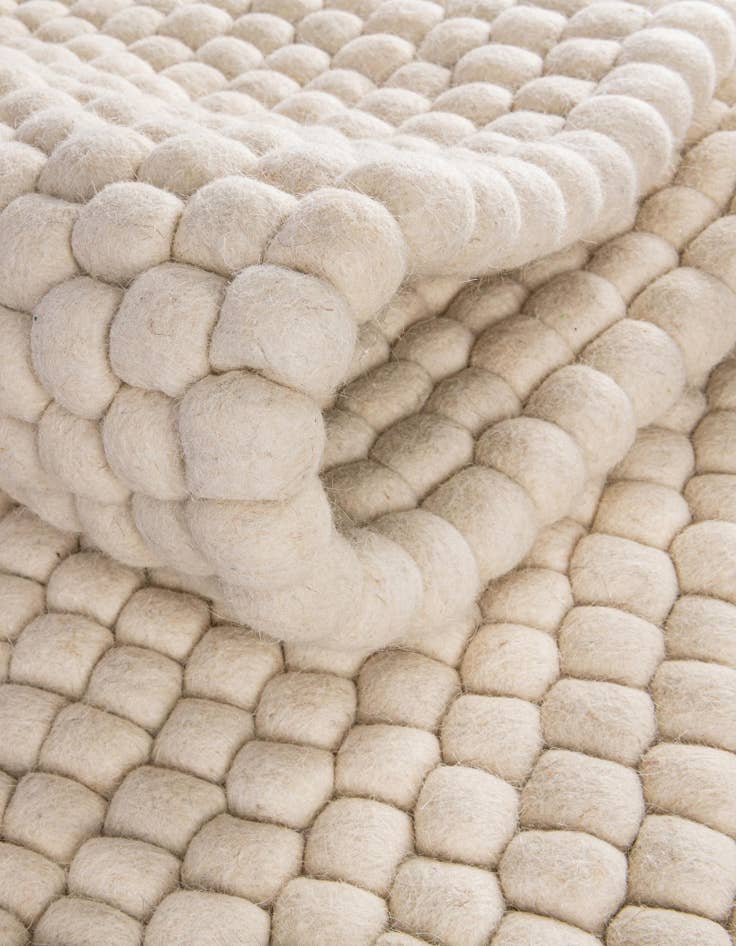 Detail image of  10' x 13' 1 Felt Ball Wool Rug