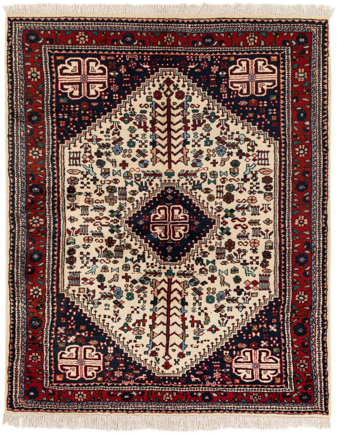 A 5x8 rectangular Hamedan rug featuring a cream medallion and tribal patterns on an ivory field with a dark blue and red border.