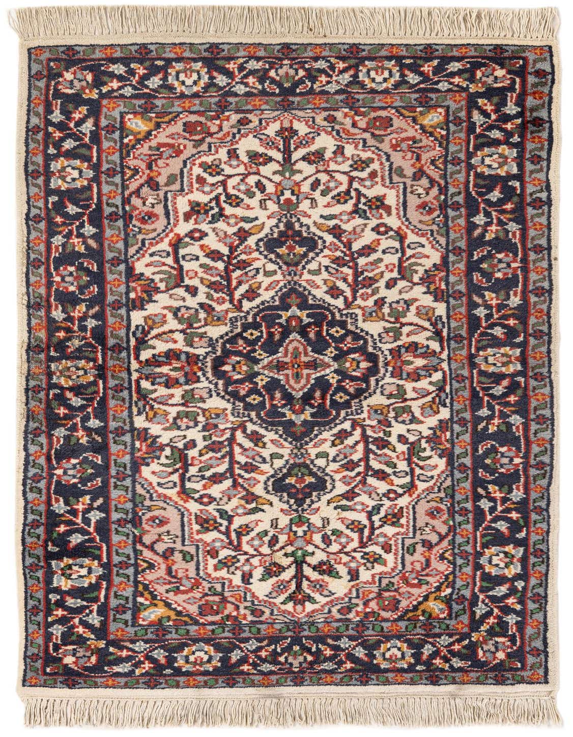 A 3x5 rectangular Isfahan rug featuring a traditional ivory field with a central medallion and a dark navy border, made of wool.