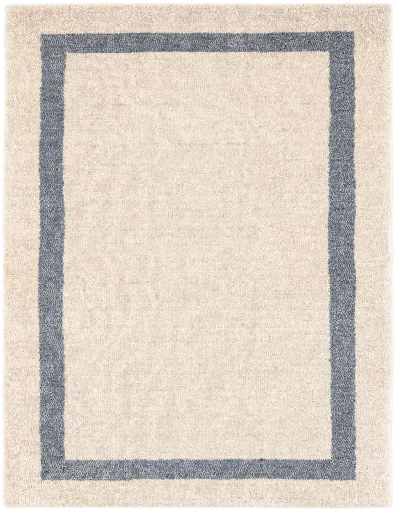 A 2x3 rectangular ivory rug with a modern abstract border in a light blue-gray color, perfect for an entryway.