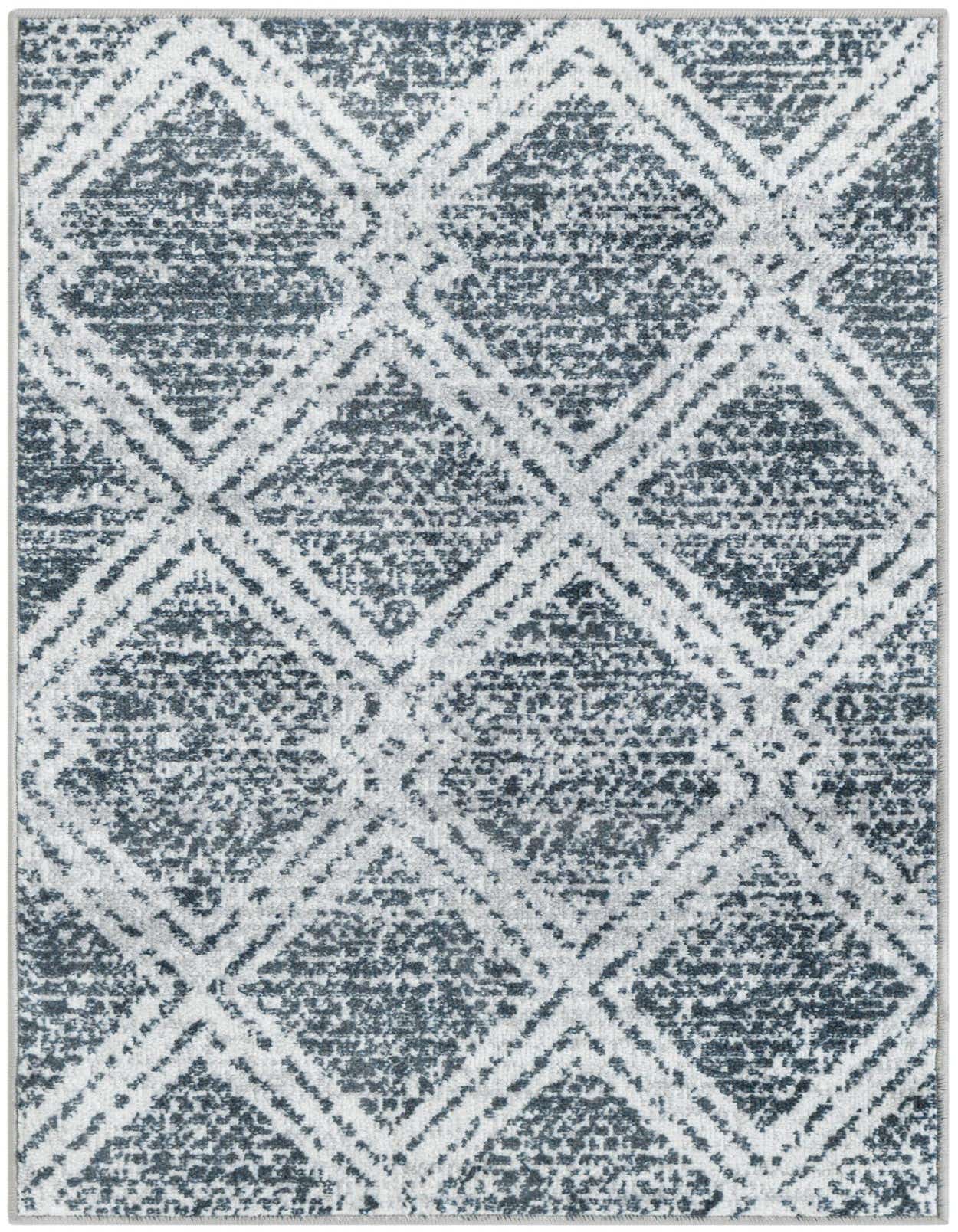 A 2x3 rectangular Kamala Washable rug featuring a distressed modern geometric pattern in ivory and dark gray.
