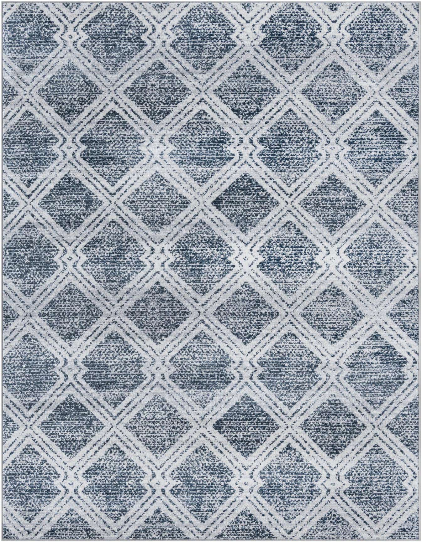 A 5x8 rectangular Kamala Washable rug featuring a modern abstract pattern in shades of ivory and cream.