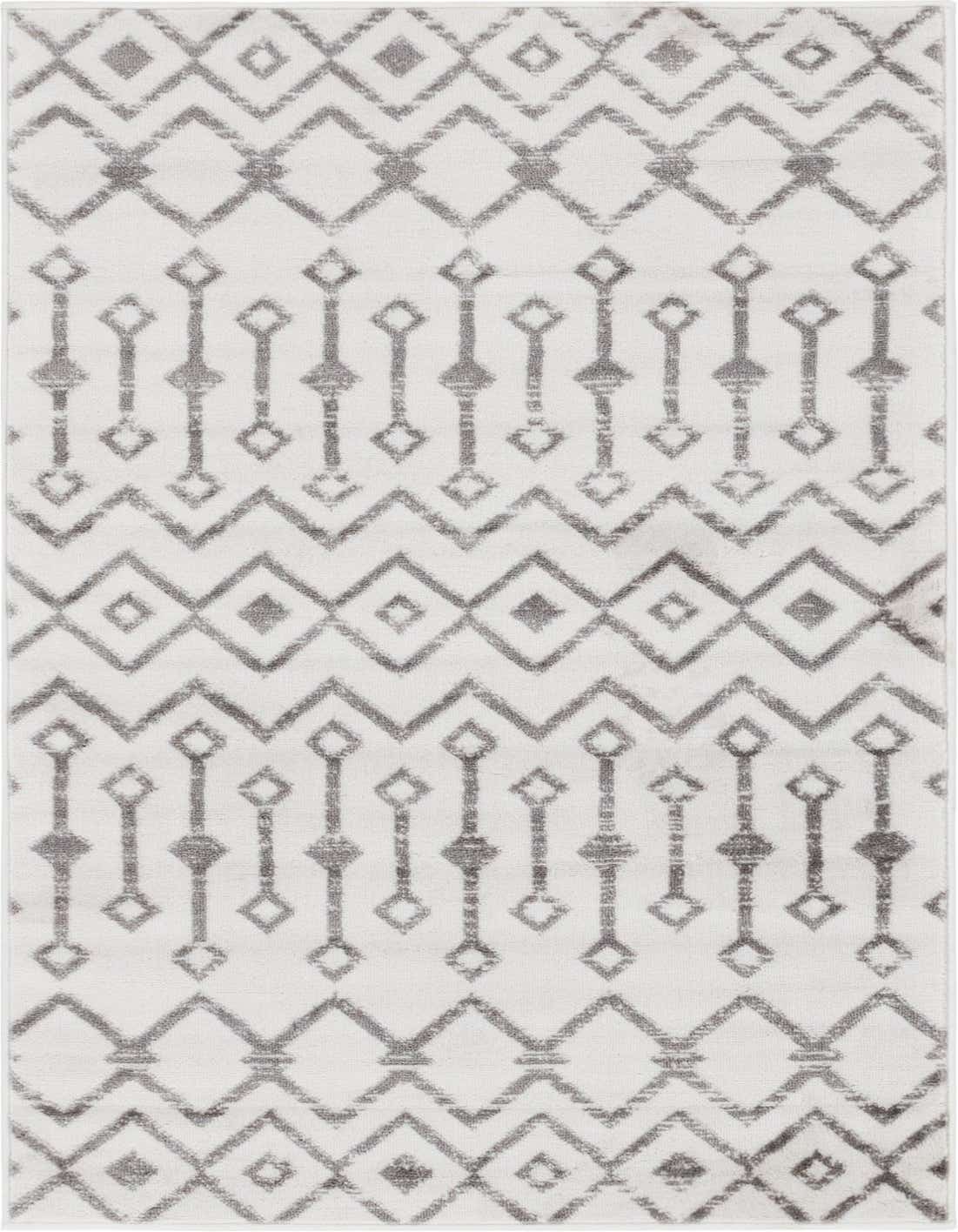 A 3x5 rectangular ivory and gray tribal trellis rug with a thin pile, ideal for a kitchen or entryway.