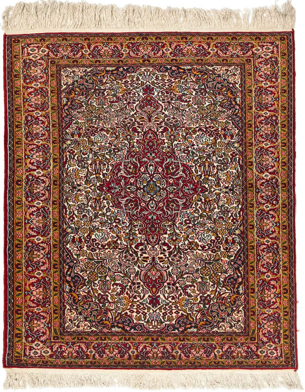 A 3x5 rectangular ivory and red traditional wool rug with a central medallion and intricate floral patterns, featuring cream fringes.