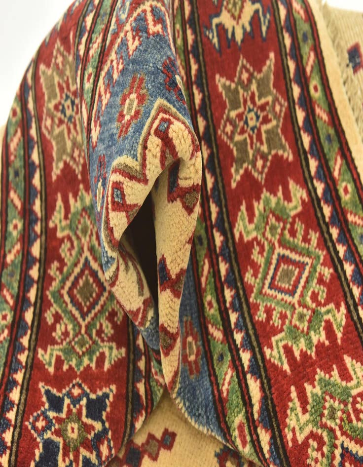 Detail image of  4' 2 x 5' 10  Hand Knotted Kazak Rug