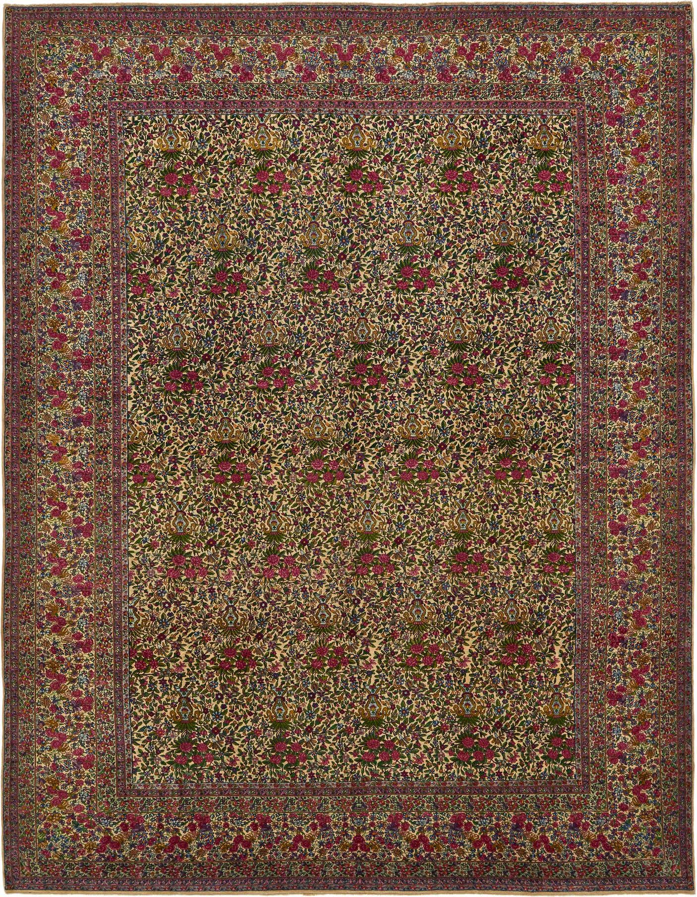 A large 10x16 rectangular Kerman rug featuring an ivory field with intricate botanical and floral patterns in pinks, greens, and blues, framed by a detailed border.