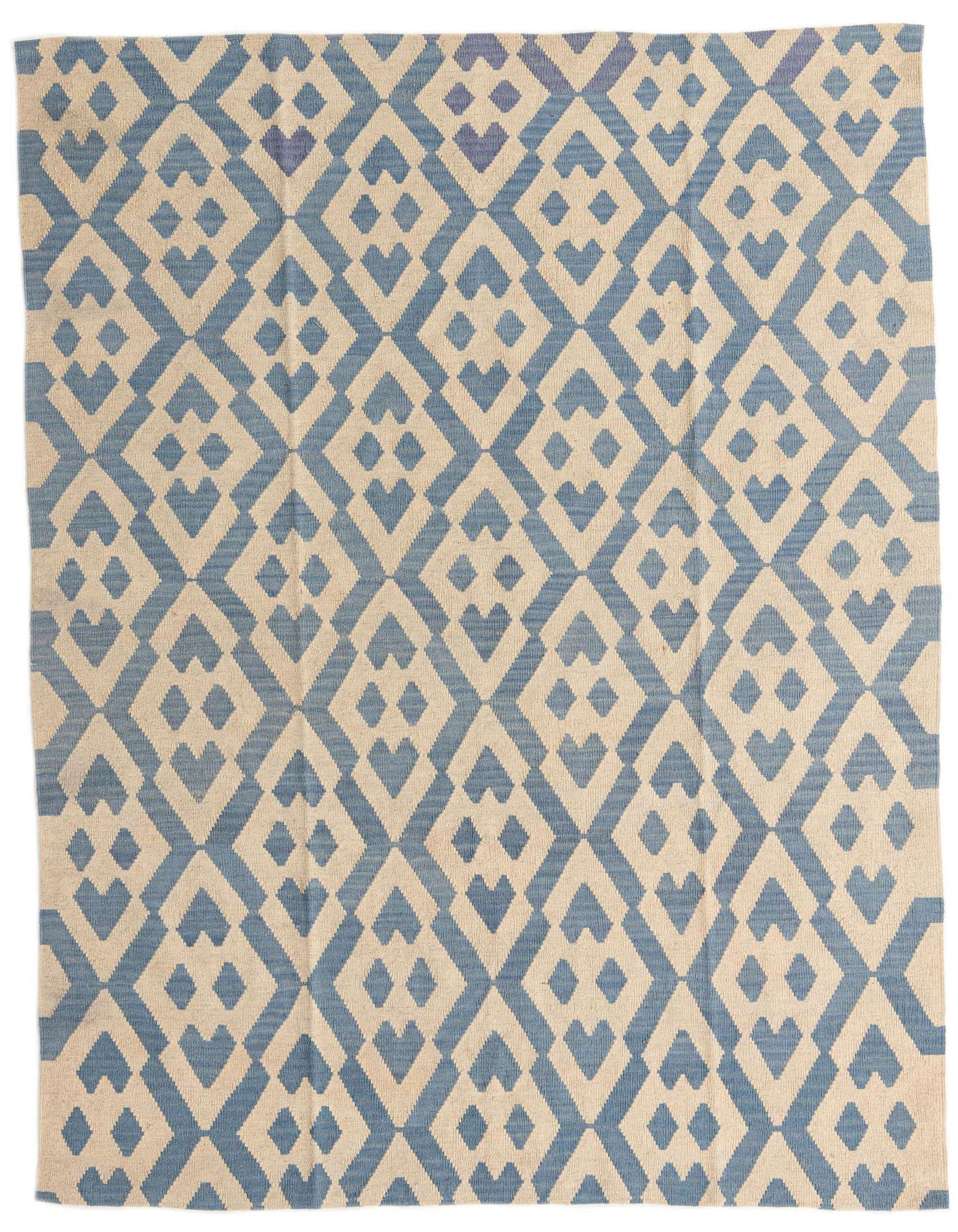 A 6x9 rectangular Kilim Modern rug with a tribal geometric pattern in shades of blue and ivory, suitable for a living room.