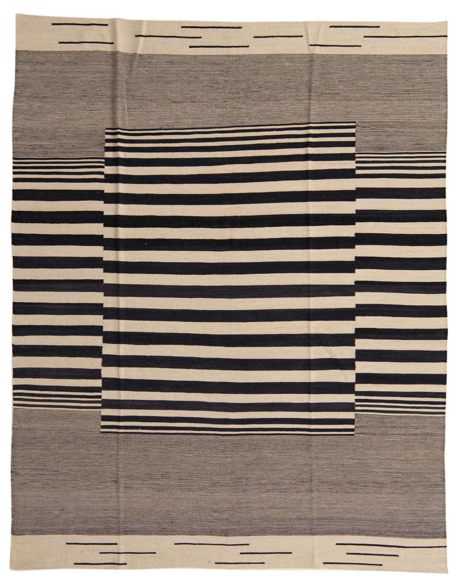 An 8x10 rectangular flatweave rug featuring a bold black and ivory stripe pattern, with a central striped rectangle framed by solid ivory and black striped borders.