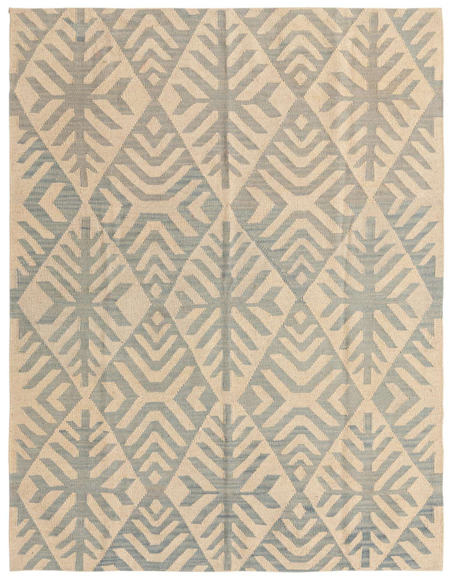 A 5x8 rectangular Kilim Modern wool rug featuring an ivory and light blue tribal geometric pattern.