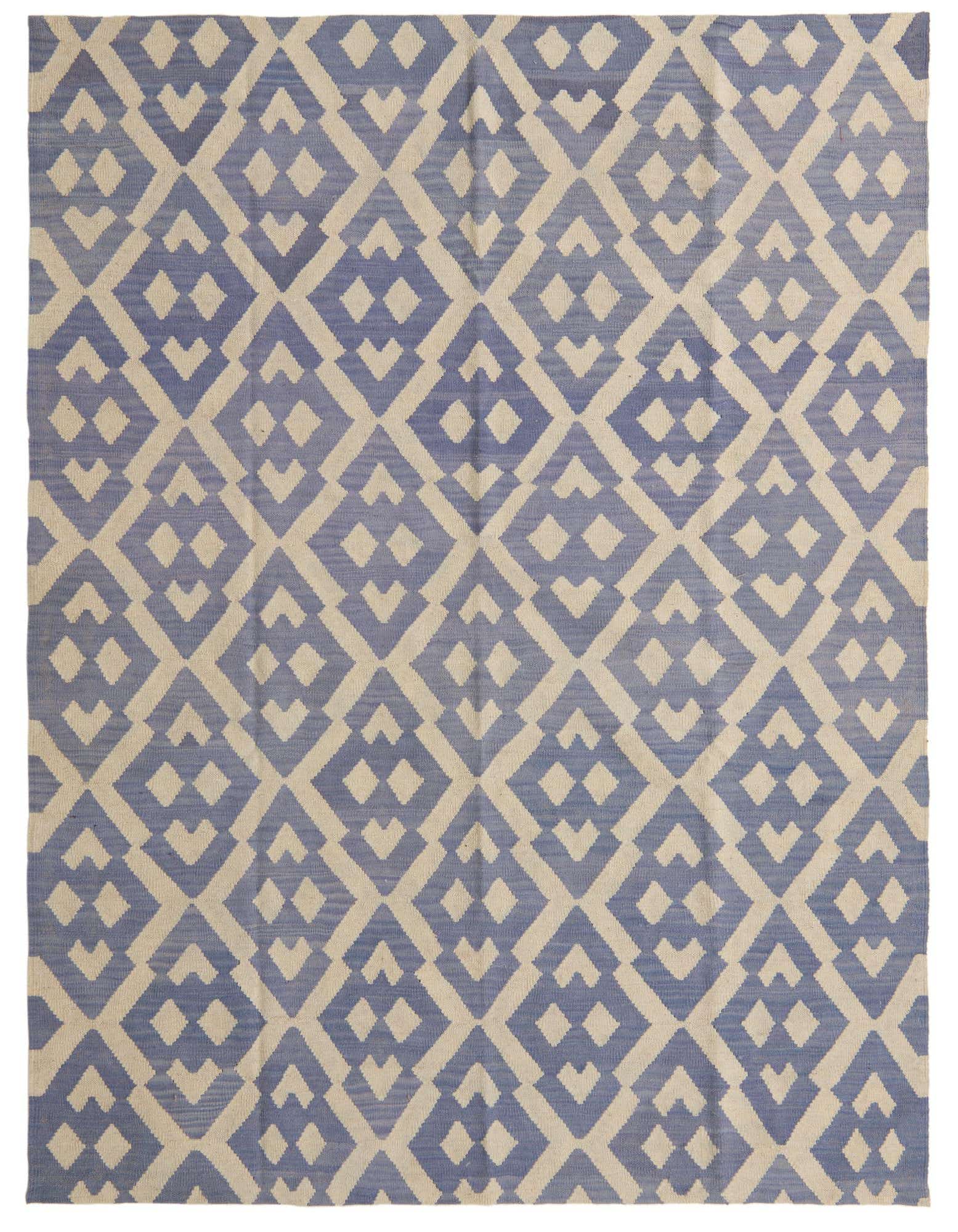 A 6x9 rectangular Kilim Modern rug with a tribal geometric pattern in shades of ivory and blue.
