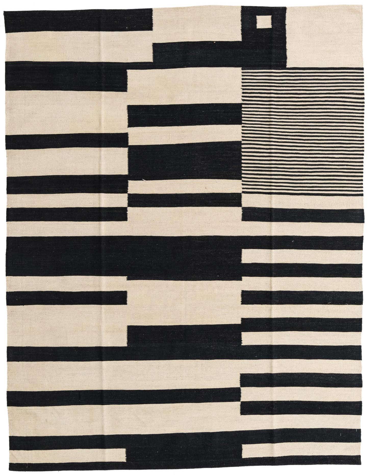 A 5x8 rectangular Kilim Modern rug from Rugs.com, featuring a bold abstract pattern of black and ivory stripes and blocks, flatweave.