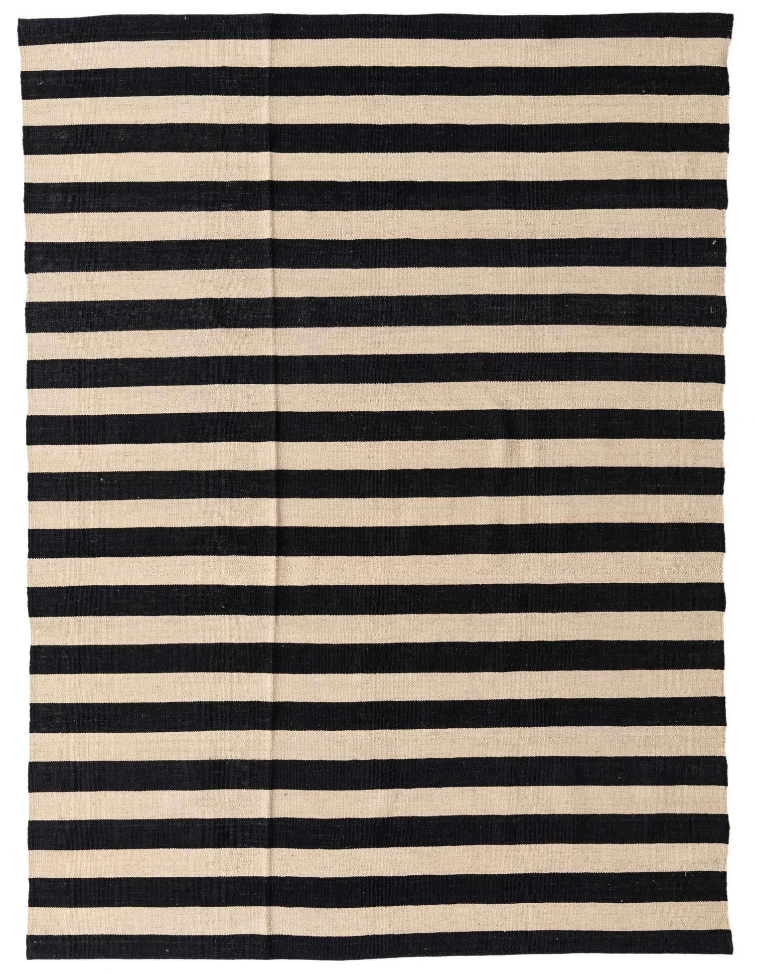 A 5x8 rectangular Kilim Modern rug with horizontal stripes in black and ivory, showcasing its flatweave texture.