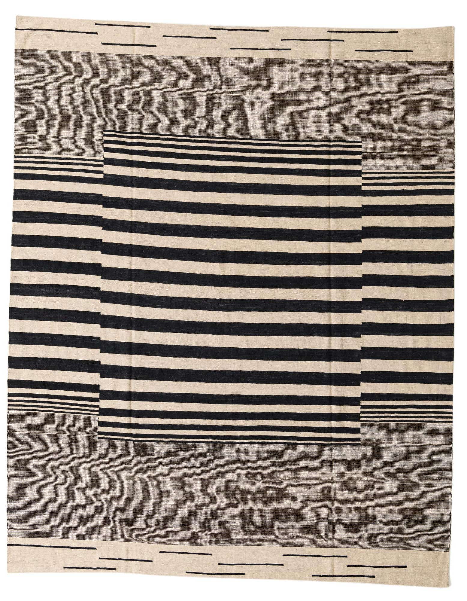 An 8x10 rectangular flatweave rug featuring a bold black and ivory striped pattern with solid ivory and black sections.