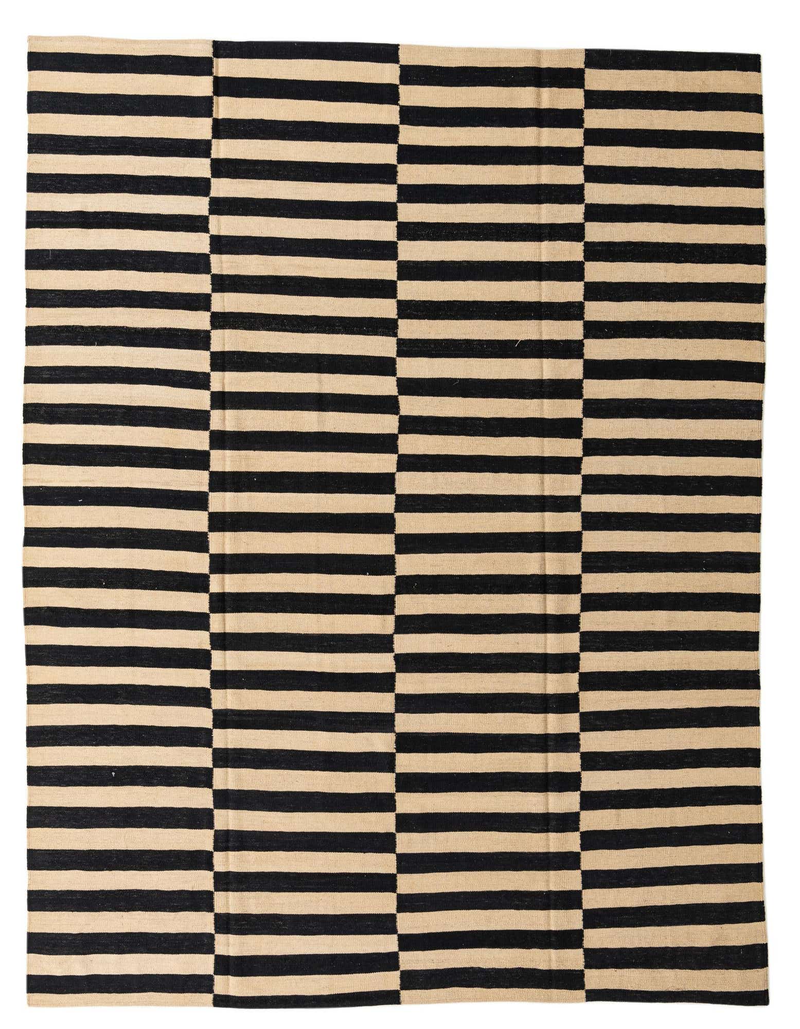 A rectangular 8x10 flatweave rug with a bold black and ivory striped pattern, featuring alternating horizontal and vertical stripes.