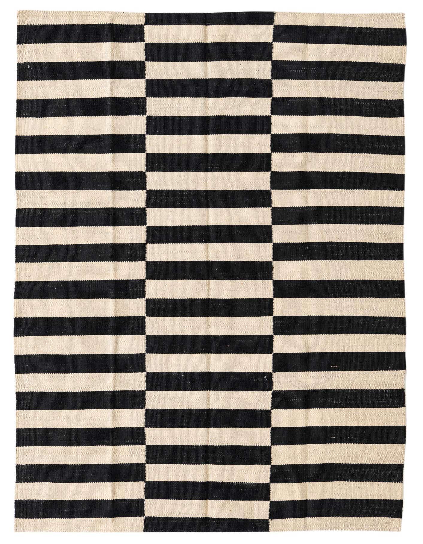 A 4x6 rectangular flatweave rug with a bold black and ivory striped pattern, perfect for a modern living room.