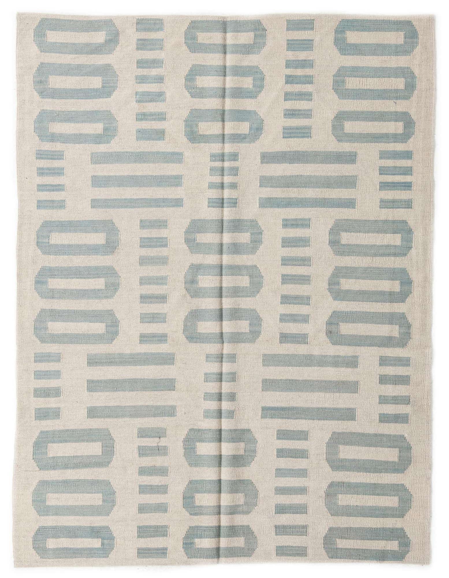 A 5x8 rectangular ivory and light blue flatweave rug with a modern tribal pattern of interlocking rectangles and lines.