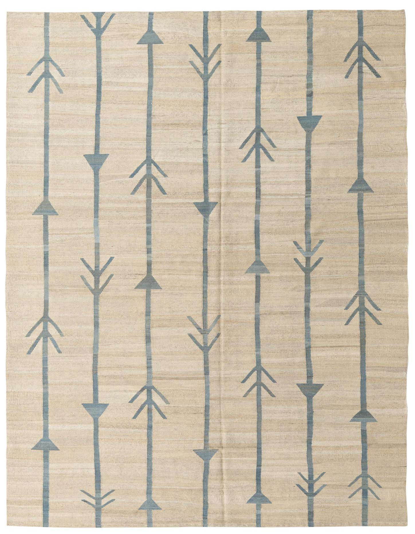 A 7x10 rectangular ivory flatweave wool rug with a modern tribal pattern of vertical blue arrow-like lines.