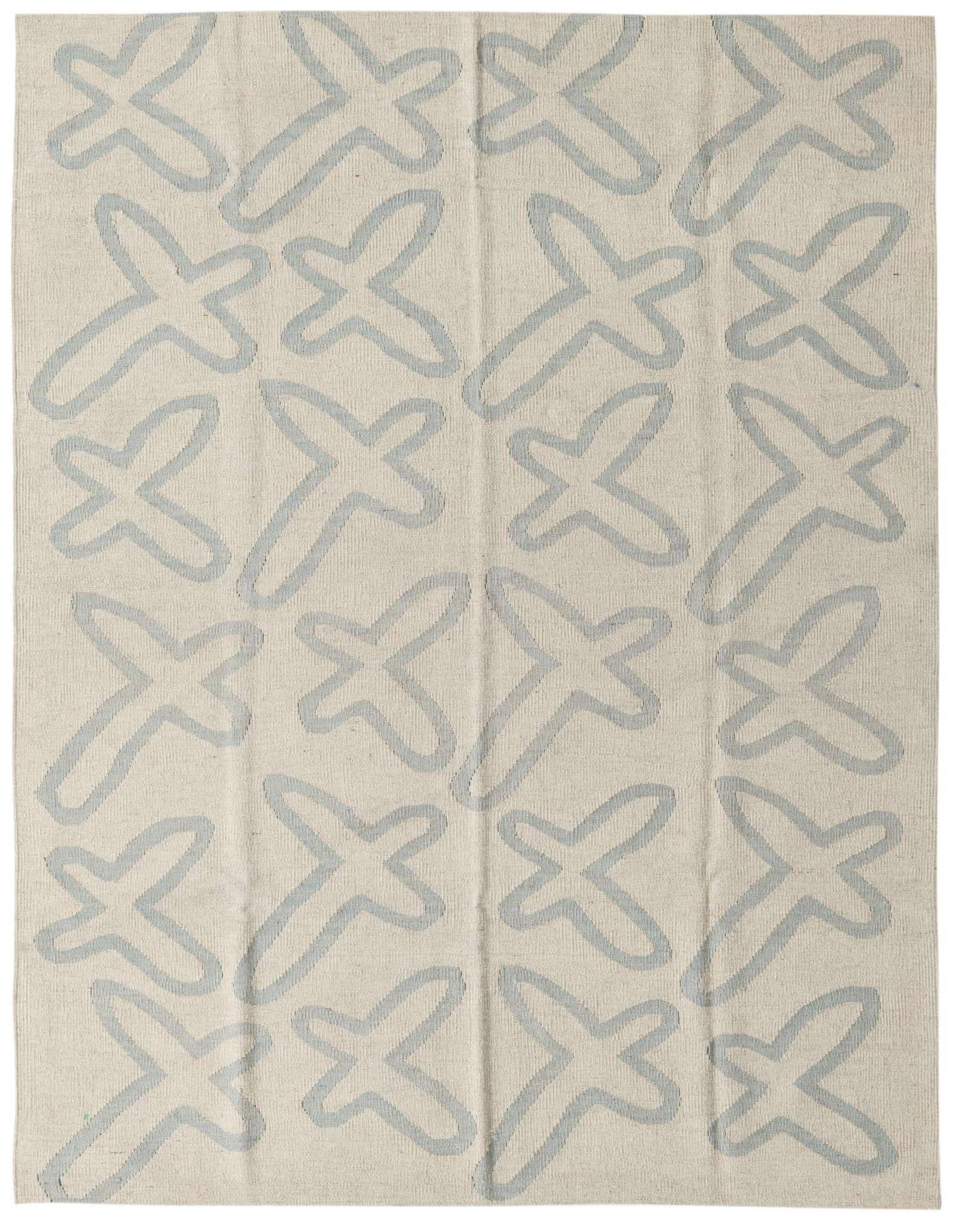 A 4x6 rectangular ivory flatweave rug with a repeating light blue abstract X-shaped tribal pattern.